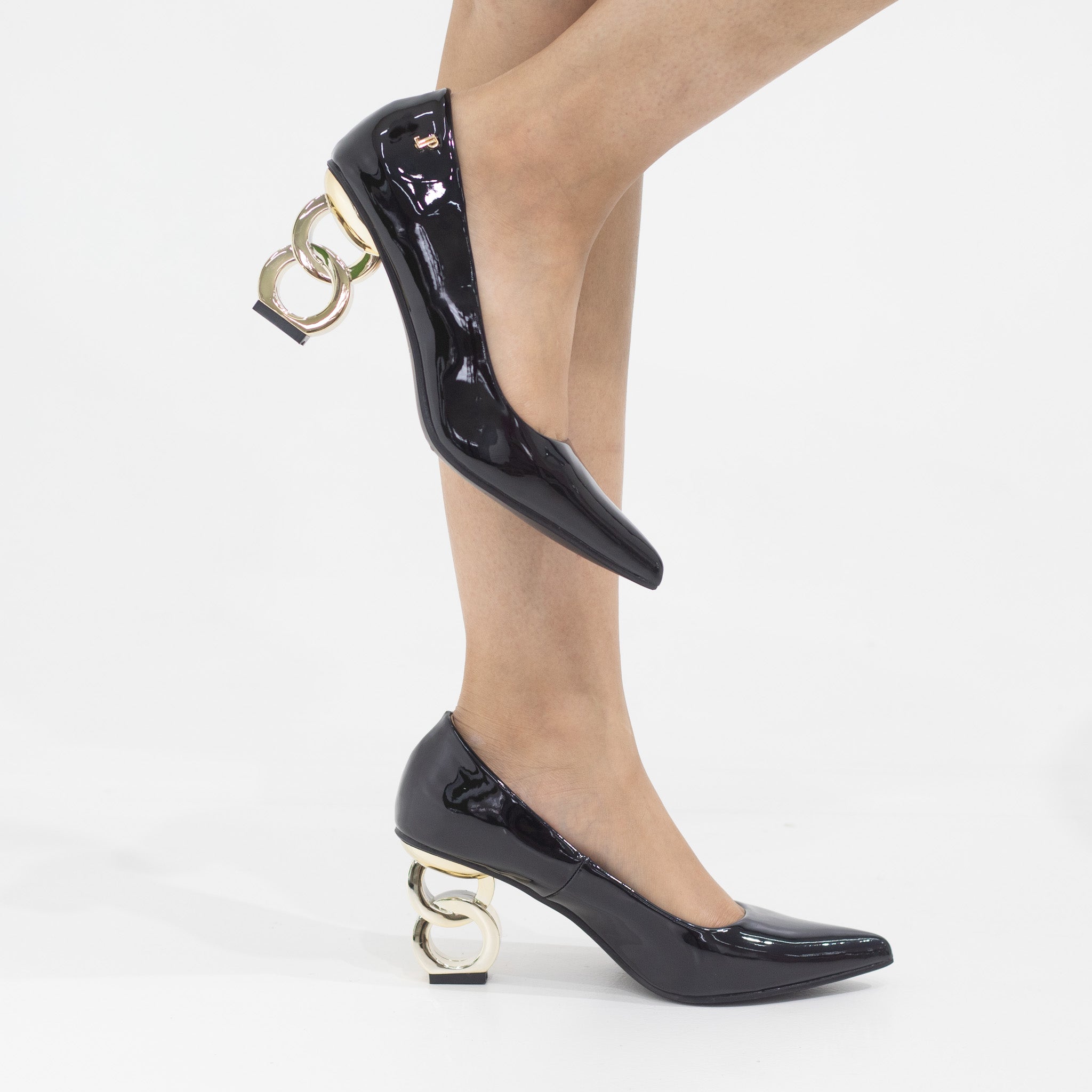 Black high heel shoe with Gold circle heel